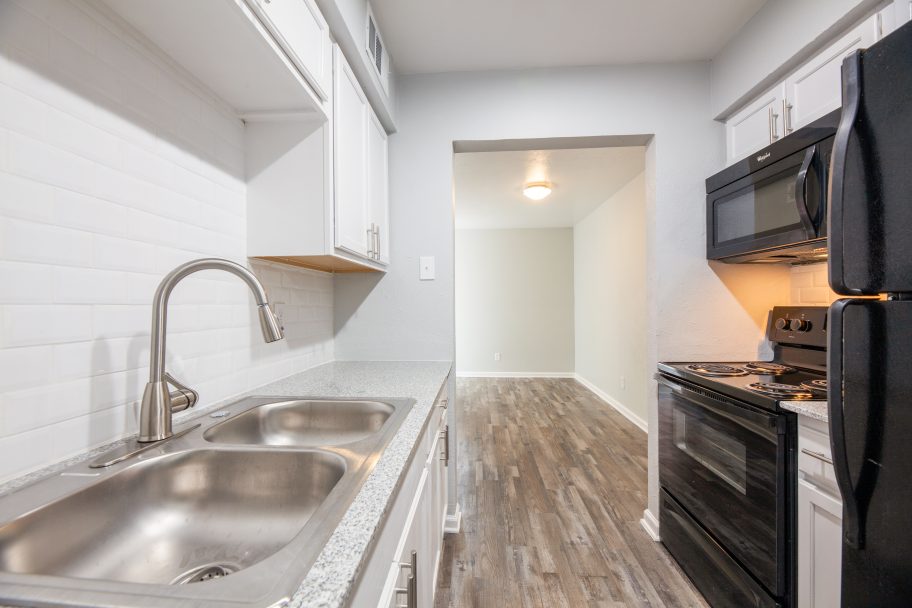 kitchen stainless sink white backsplash